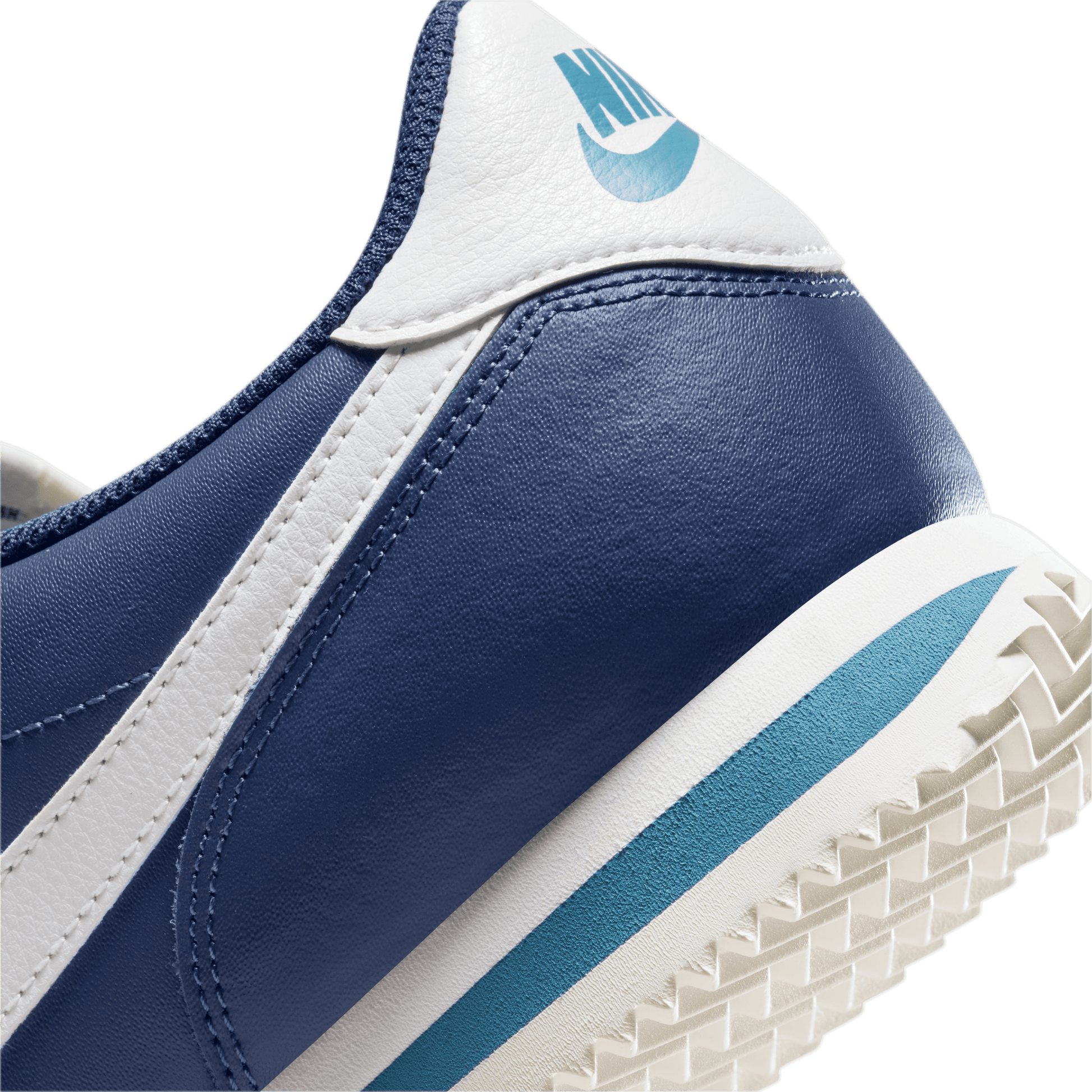 White and navy blue top nike cortez